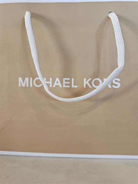 Michael Kors, 639 E Shaw Ave, Ste 169, Fresno, CA 93710, US.